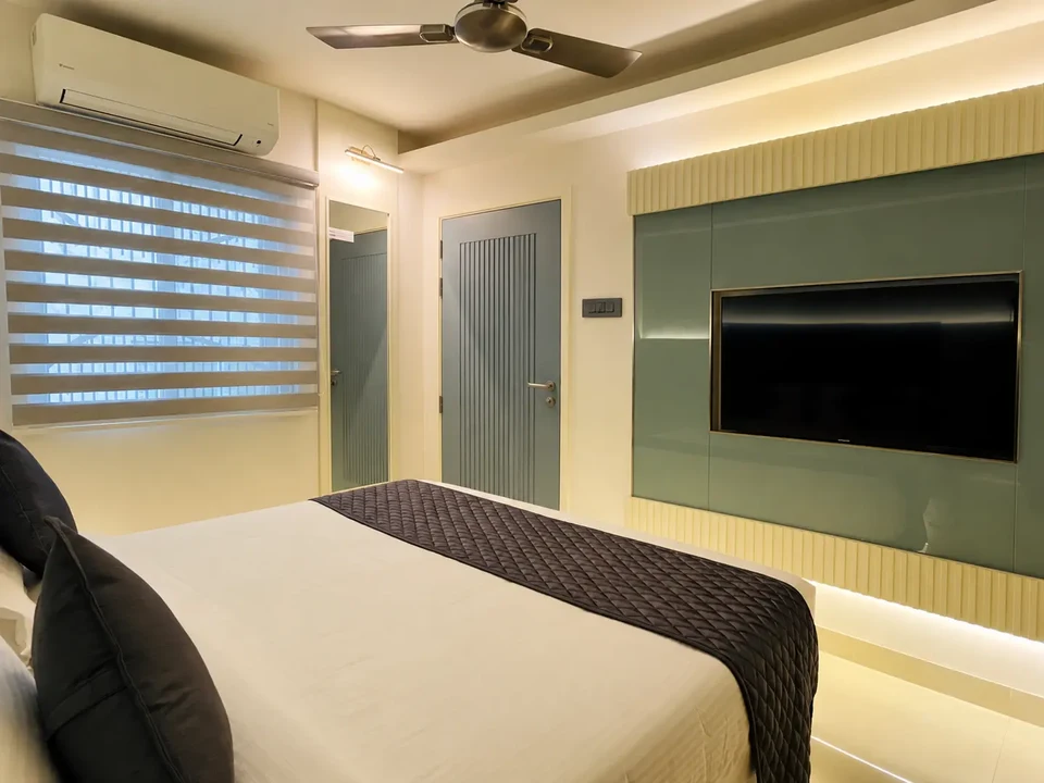 Standard Room — television and window